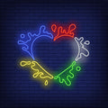 Heart-shaped LED neon Sign with vibrant paint splashes, perfect for Valentine's Day decor. 