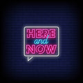 Here and now pink neon sign